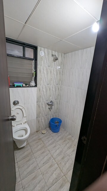 Bathroom in 2 BHK Apartment at Paranjape Richmond Park, Rahatani – for Rent