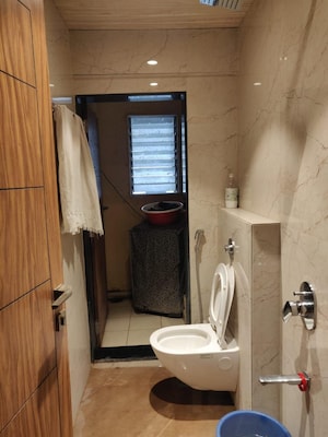 Bathroom in 1 BHK Apartment at Raunak Bliss, Ghodbunder Road – for Rent
