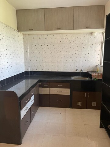 Kitchen in 2 BHK Apartment at Spring Glory Co-Operative Society, Kharadi – for Rent
