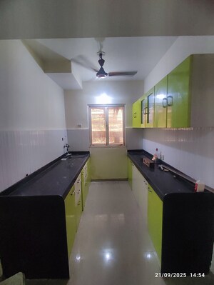 Kitchen in 2 BHK Apartment at Rustomjee Avenue J, Virar West – for Rent