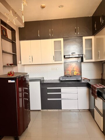 Kitchen in 3 BHK Apartment at Habitech Greens, Tech Zone 4 Greater Noida – for Rent