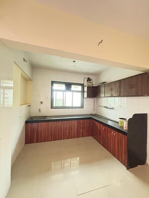Kitchen in 3 BHK Apartment at Om Paradise Nerul, Nerul Sector 50e – for Rent