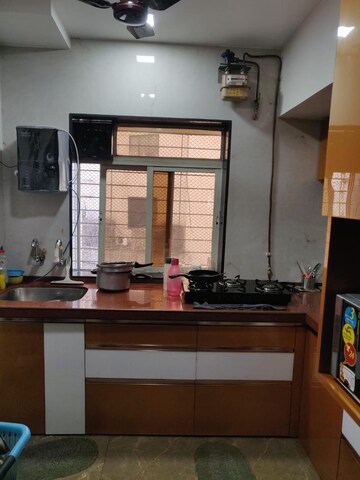 Kitchen in 1 BHK Apartment at Puranik City, Kasarvadavali – for Rent