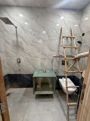 Bathroom in 3 BHK Builder Floor at Green Park – for Sale