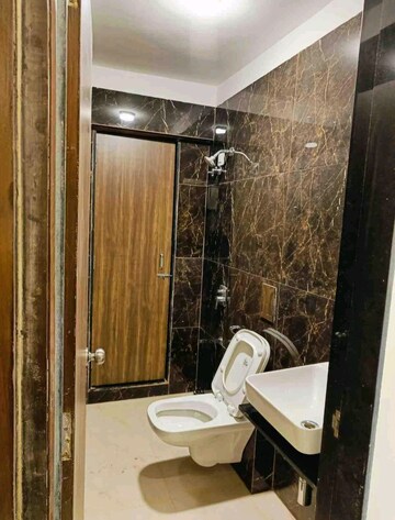 Bathroom in 3 BHK Apartment at Mahavir Square, Manpada – for Rent