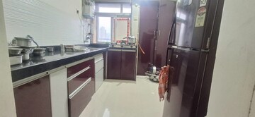 Kitchen in 2 BHK Apartment at Squarefeet Ace Square, Ghodbunder Road – for Sale