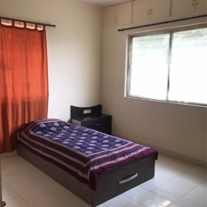 Bedroom in 2 BHK Apartment at Amit Nandanvan, Pimple Nilakh – for Rent