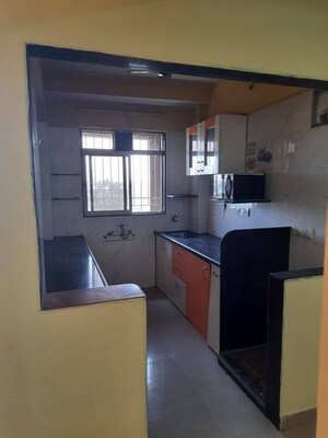 Kitchen in 1 BHK Apartment at Rajhans Kshitij, Vasai West – for Sale
