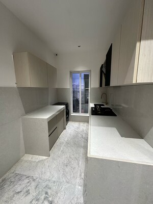 Kitchen in 2 BHK Apartment at Dev Leo Tower, Adarsh Nagar – for Sale