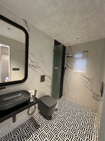 Bathroom in 2 BHK Apartment at Dev Leo Tower, Adarsh Nagar – for Sale