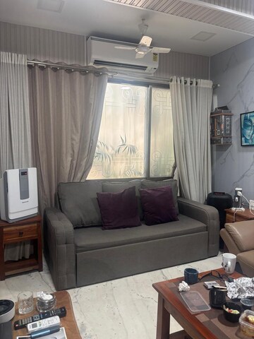 Living Room in 1 BHK Apartment at Bandra West – for Rent