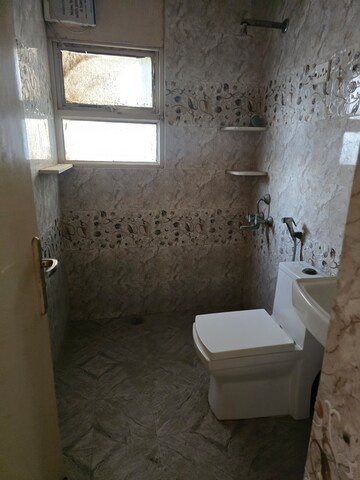 Bathroom in 2 BHK Apartment at Ansal Valley View Estate, Gwal Pahari – for Rent