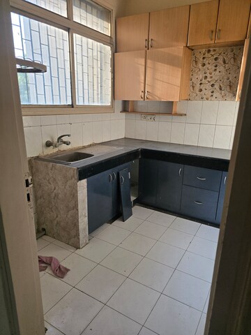 Kitchen in 2 BHK Apartment at Ansal Valley View Estate, Gwal Pahari – for Rent