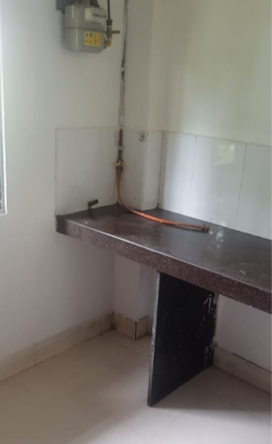 Kitchen in 1 BHK Apartment at Krishna Sthal Nandanvan, Miragaon – for Rent