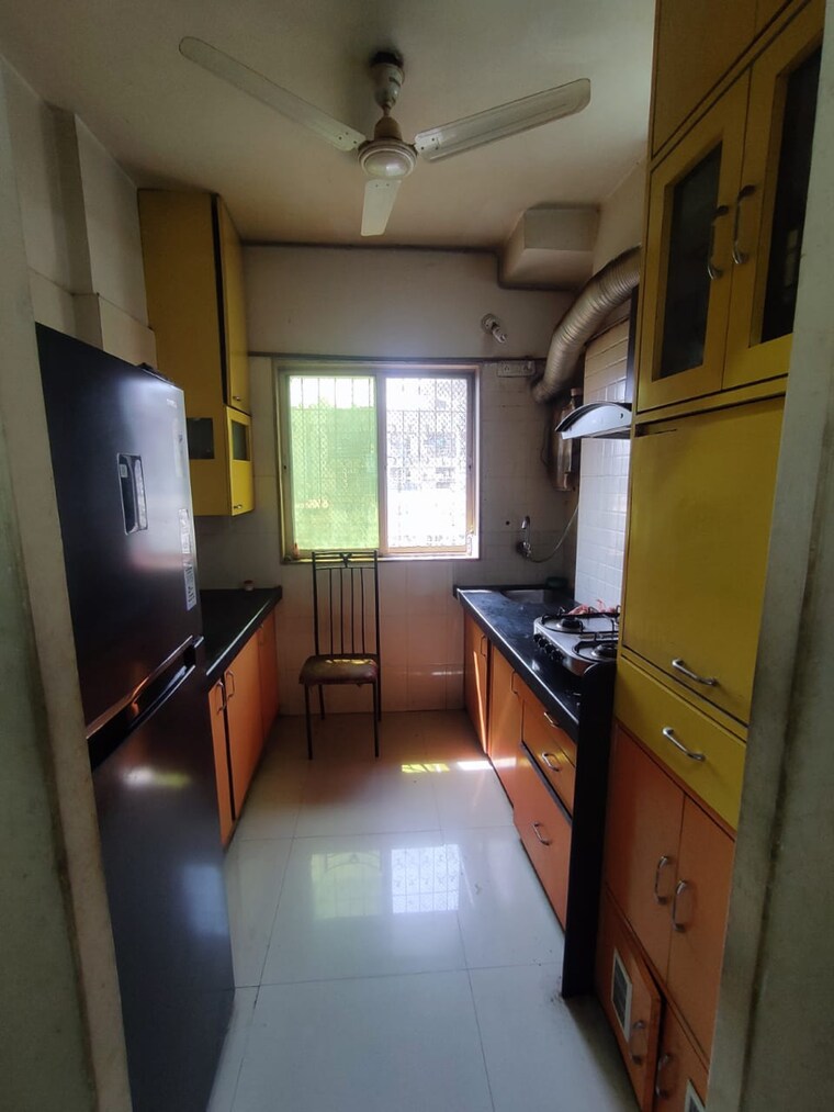 Kitchen, silver-crown 1 Bedroom 550 Sq.Ft. Apartment In Kanakia Road Thane 9225279