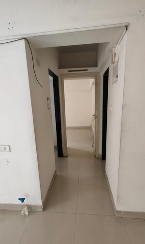 Building Lobby in 1 BHK Apartment at Ajmera Valencia, Bhakti Park – for Rent