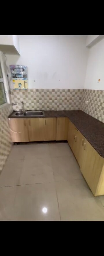 Kitchen in 2 BHK Apartment at Eureka Diya Green City, Raj Nagar Extension – for Sale