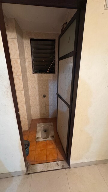 Bathroom in 1 BHK Apartment at Rutu Estate, Brahmand – for Rent