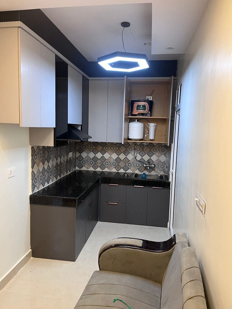 Kitchen, signature-global-golf-greens 3 Bedroom 728 Sq.Ft. Apartment In Sector 79 Gurgaon 9225420