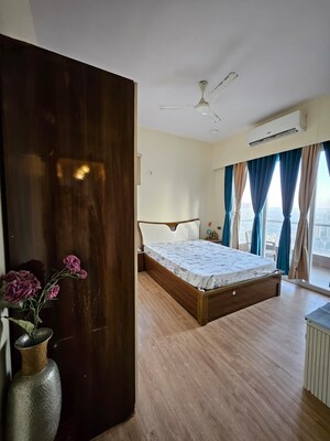 Bedroom in 2 BHK Apartment at Omkar Alta Monte, Malad East – for Rent