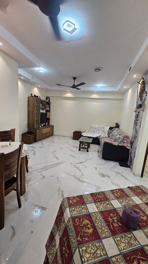 Living Room in 2 BHK Apartment at Malad West – for Sale