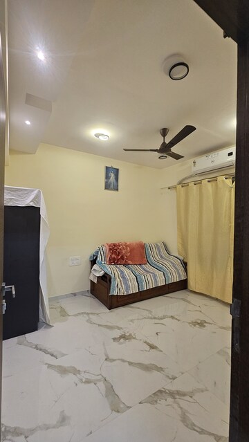 Living Room in 2 BHK Apartment at Malad West – for Sale