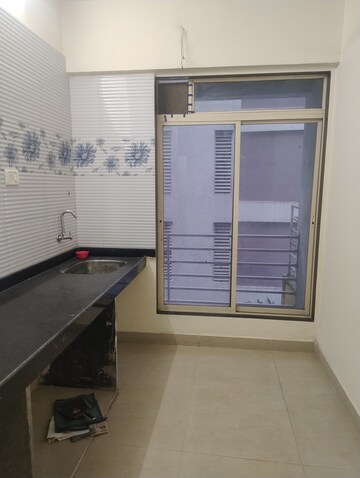Kitchen in 1 BHK Apartment at Bharti Soham Residency, Ulwe Sector 17 – for Sale