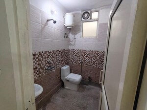 Bathroom in 1 BHK Builder Floor at Freedom Fighters Enclave – for Rent
