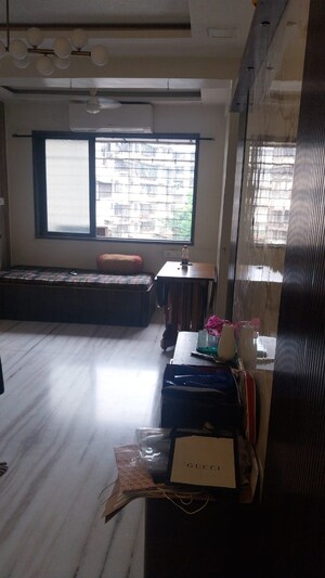 Living Room in 2 BHK Apartment at Saptarshi CHS, Malad West – for Rent