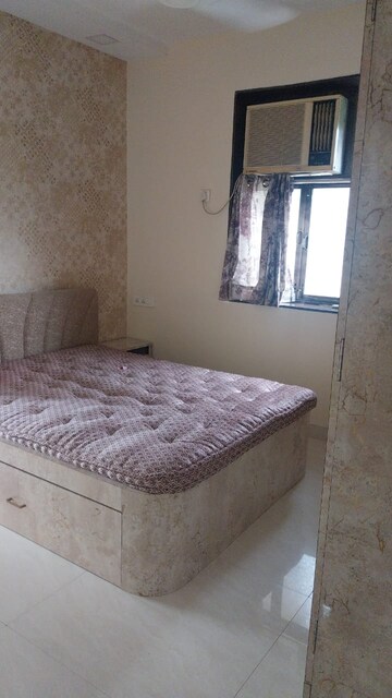 Bedroom in 2 BHK Apartment at Saptarshi CHS, Malad West – for Rent