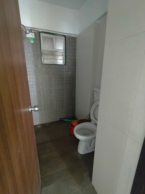 Bathroom in 2 BHK Apartment at Janki Golden Nest, Handewadi – for Sale