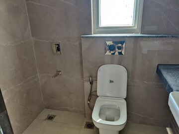 Bathroom in 3 BHK Apartment at Smart World Orchard, Sector 61 – for Rent