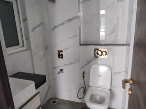 Bathroom in 3 BHK Apartment at Smart World Orchard, Sector 61 – for Rent