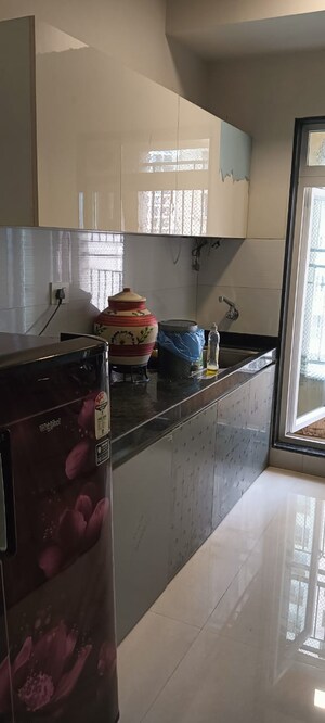 Kitchen in 2 BHK Apartment at Rustomjee Urbania Azziano, Thane West – for Sale