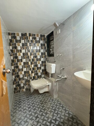 Bathroom in 2 BHK Apartment at Vaishnavi Virat CHS, Virar West – for Sale