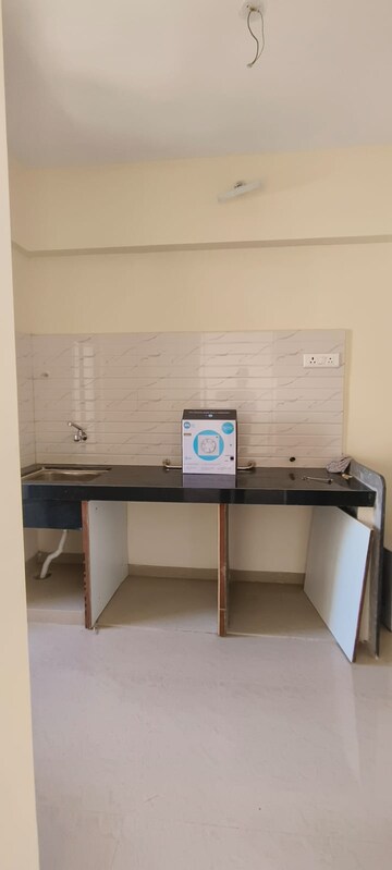 Kitchen in 2 BHK Apartment at Ram Pushpanjali Residency, Owale – for Rent