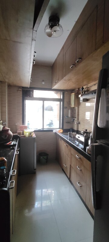 Kitchen in 2 BHK Apartment at Dheeraj Uphar CHS. LTD., Malad East – for Rent