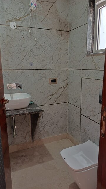 Bathroom in 3 BHK Apartment at Sharvehid Apartment, Sector 17 Dwarka – for Rent