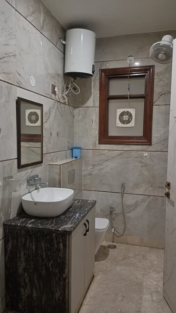 Bathroom in 3 BHK Apartment at Sharvehid Apartment, Sector 17 Dwarka – for Rent