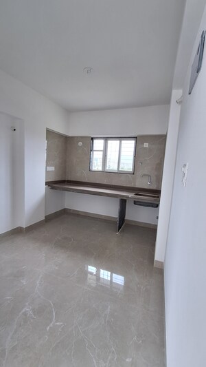 Kitchen in 1 BHK Apartment at Shubhangam Apartment, Warje – for Sale