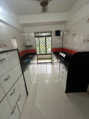Kitchen in 3 BHK Apartment at Swapnalok Towers, Malad East – for Rent