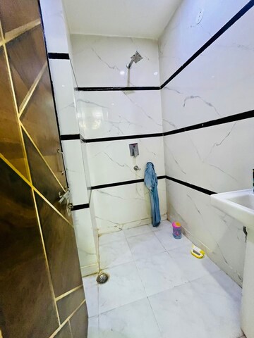 Bathroom in 3 BHK Builder Floor at Dwarka Mor – for Rent
