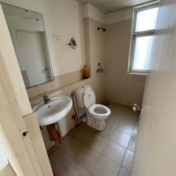 Bathroom in 4 BHK Apartment at Piedmont Taksila Heights, Sector 37c – for Rent