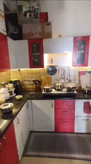 Kitchen in 2 BHK Apartment at Mahagun Mywoods, Sector 16c Greater Noida – for Rent