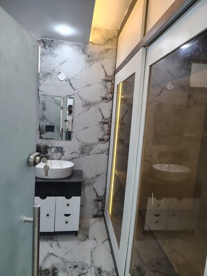 Bathroom in 3 BHK Builder Floor at Dhakoli – for Sale