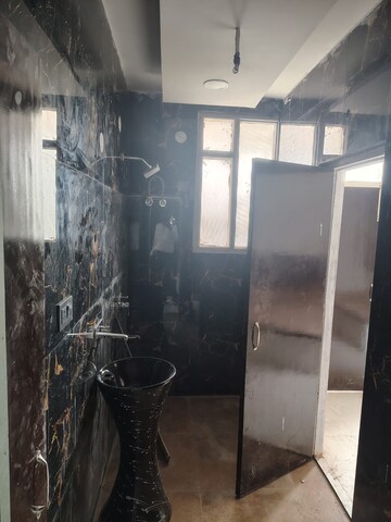 Bathroom in 3 BHK Builder Floor at Dhakoli – for Sale