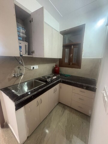 Kitchen in 1 BHK Apartment at Freedom Fighters Enclave – for Rent