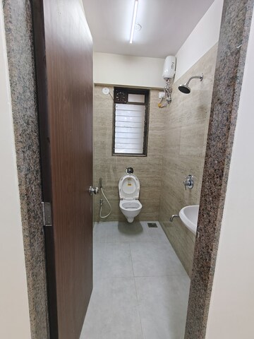 Bathroom in 1 BHK Apartment at Abrol Signature, Malad West – for Rent