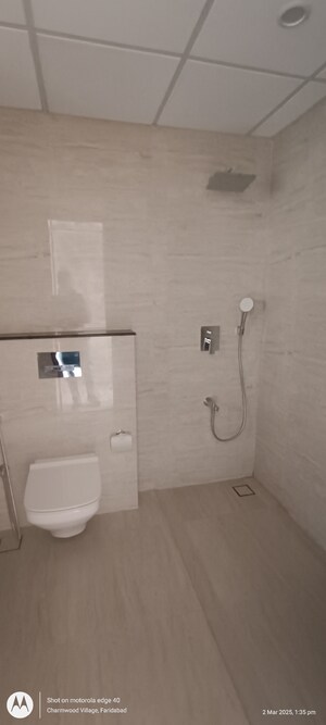 Bathroom in 4 BHK Apartment at Eros Edenwood Towers, Lakkarpur – for Sale