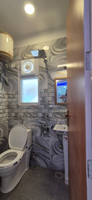 Bathroom in 1.5 BHK Builder Floor at Chattarpur – for Rent